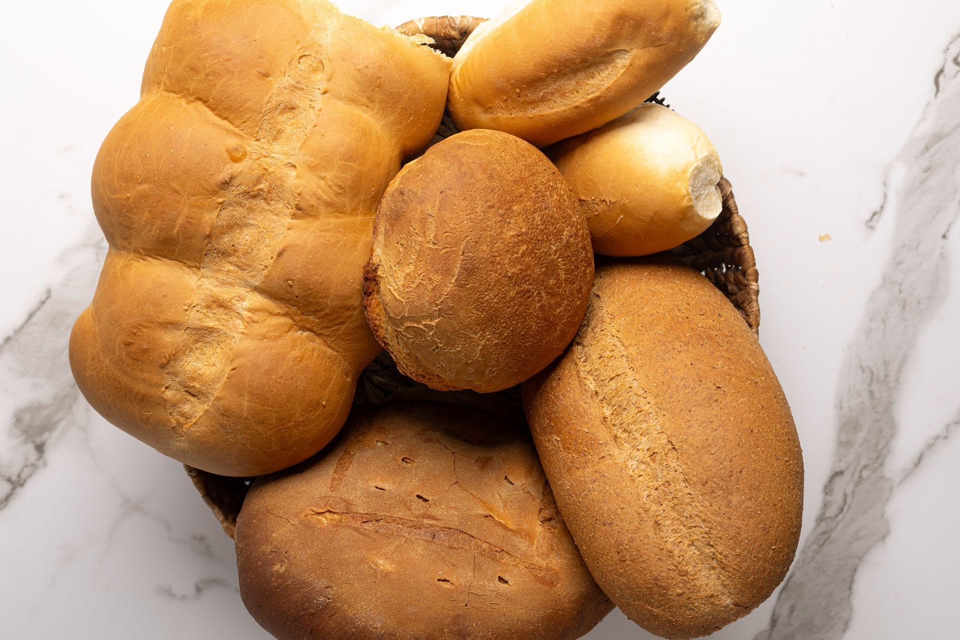 A platter of rolls and buns made fresh daily