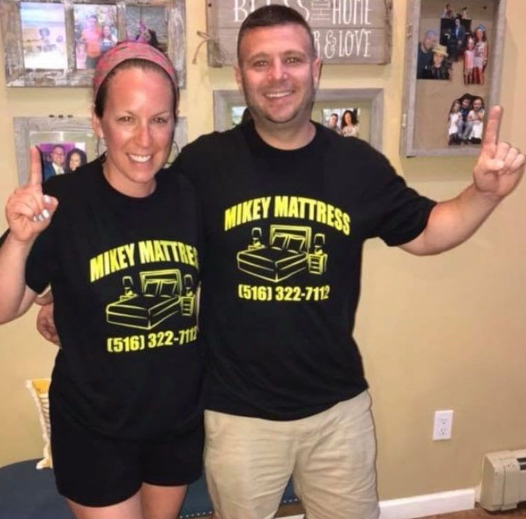 a man and a woman wearing shirts that say mikey mattress