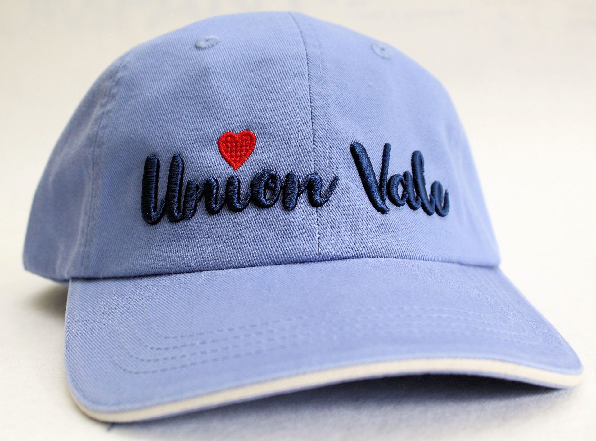 A light blue baseball cap with 