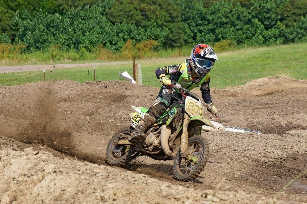 A Person is Riding a Dirt Bike on a Dirt Track — Mackay Kawasaki in North Mackay, QLD