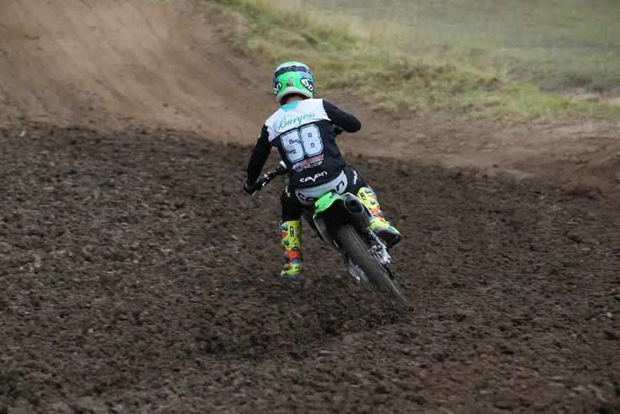 A Person is Riding a Dirt Bike on a Muddy Track — Mackay Kawasaki in North Mackay, QLD