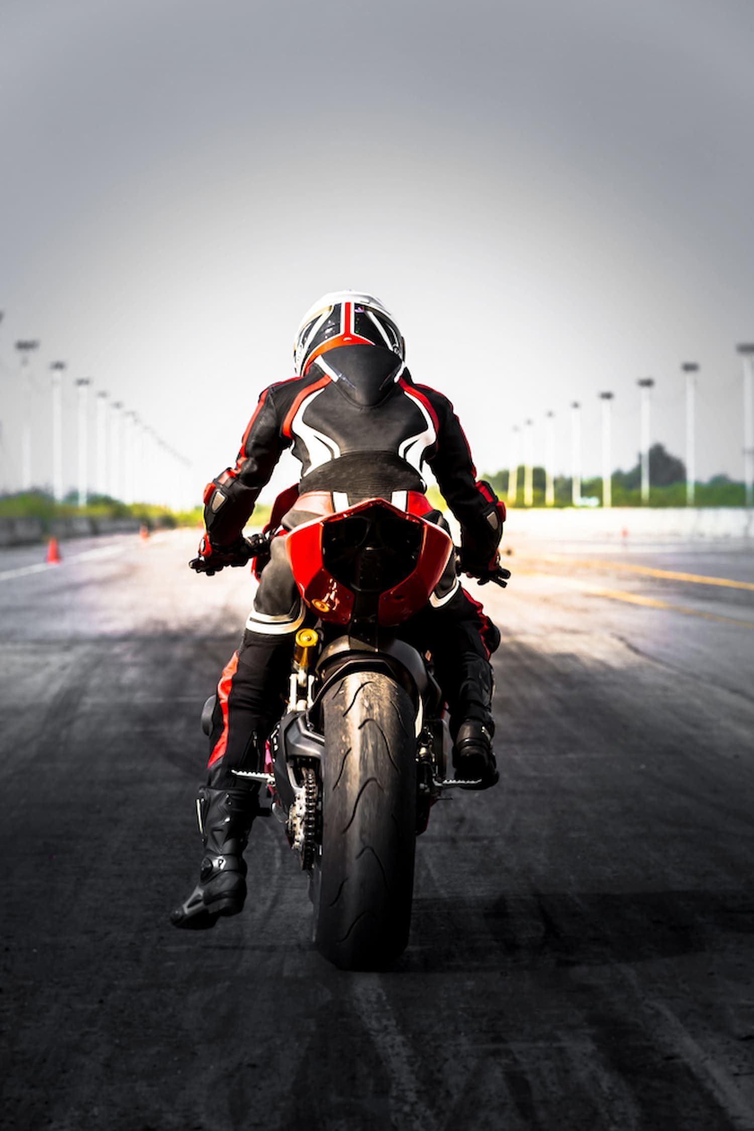 A Person is Riding a Red Motorcycle on a Track — Mackay Kawasaki in North Mackay, QLD