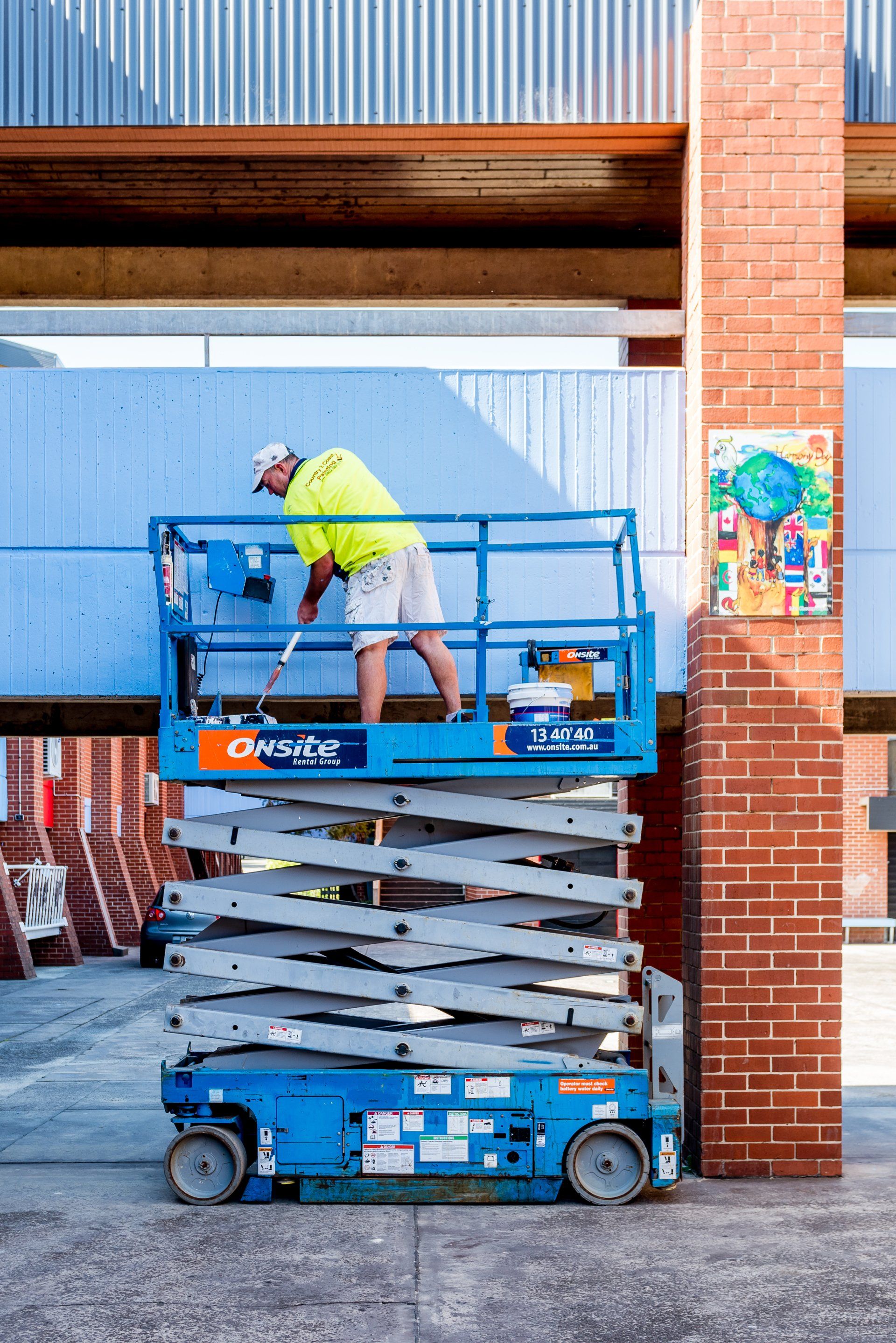 A man painting the wall