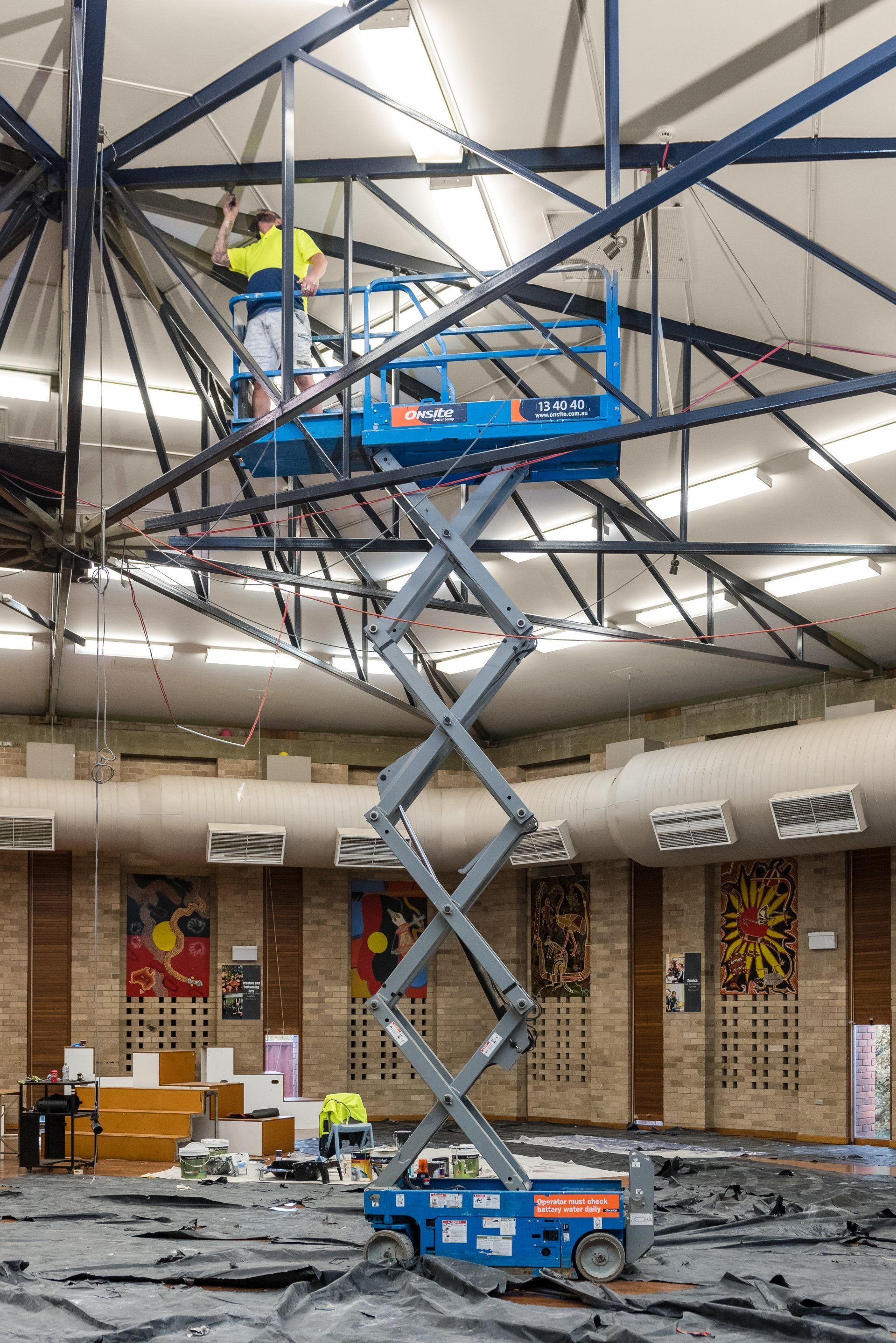 Man painting the ceiling