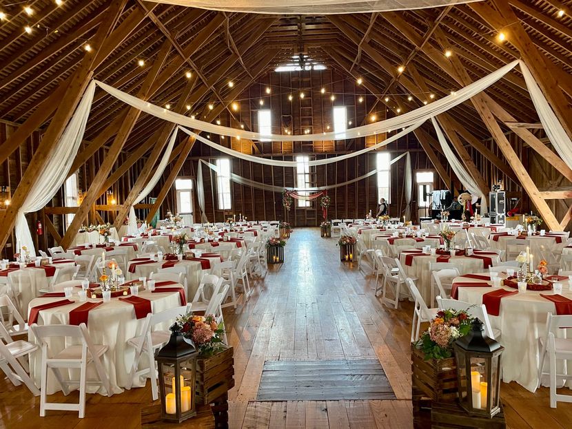 Elegant table setting with pink and gold floral arrangements and decor for a special event.
