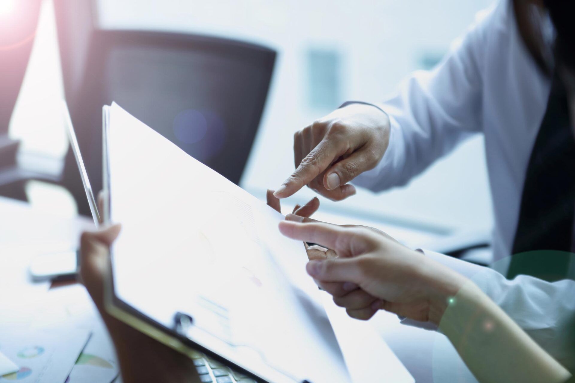 Close Up View Of Document Being Reviewed — Tampa, FL — Aer Consulting Inc