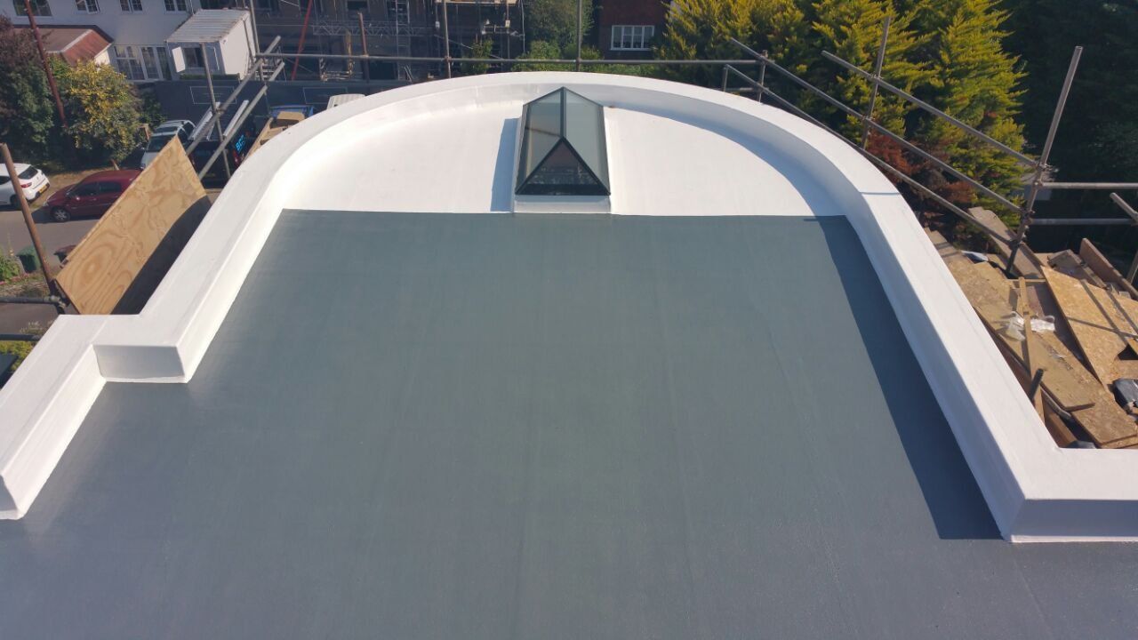 The roof of a building with a dome on top of it.