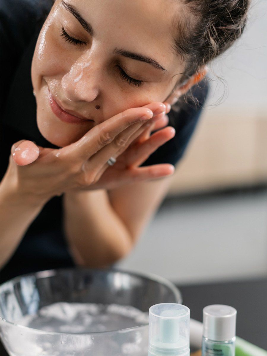 girl washing face