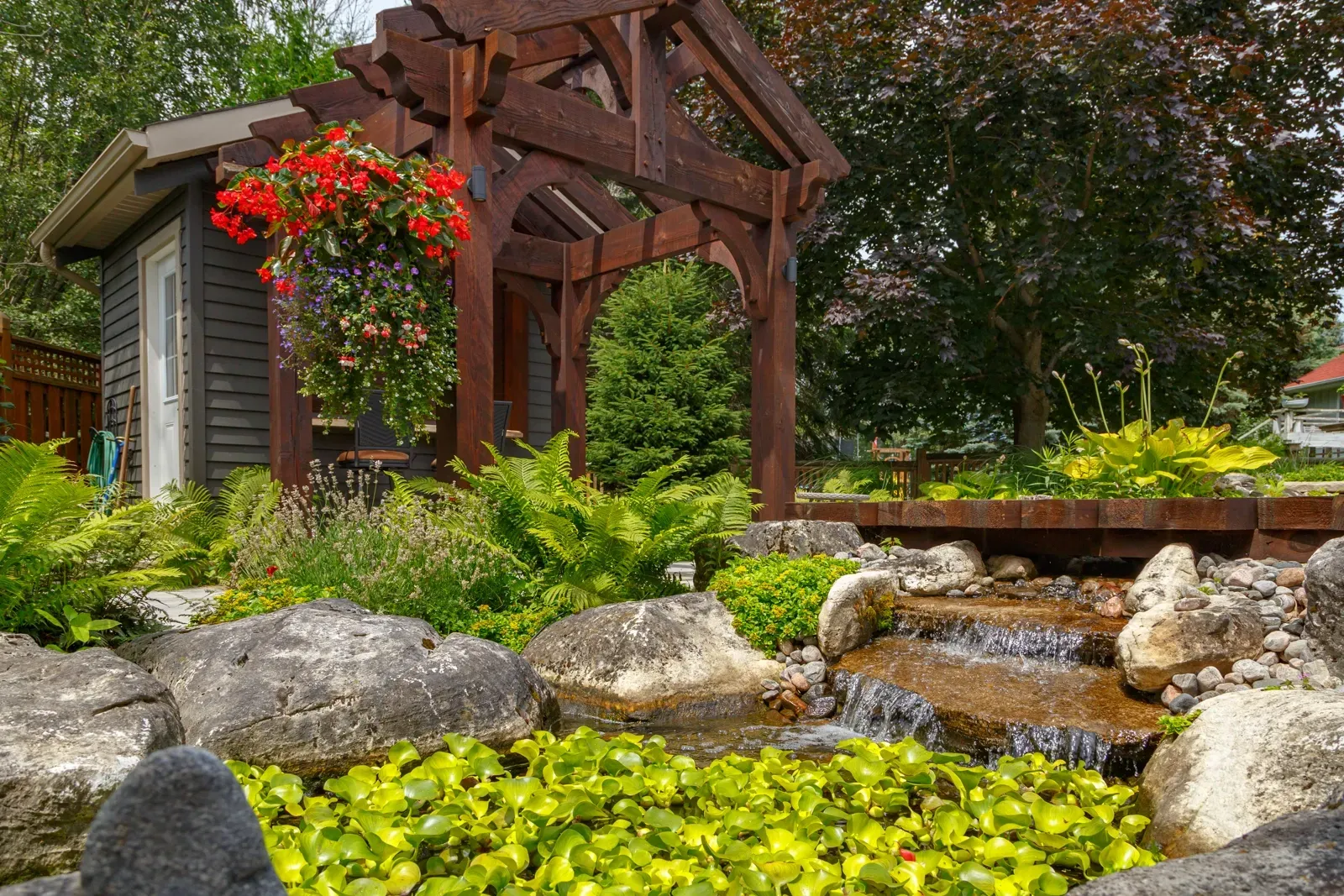 There is a waterfall in the middle of the garden.