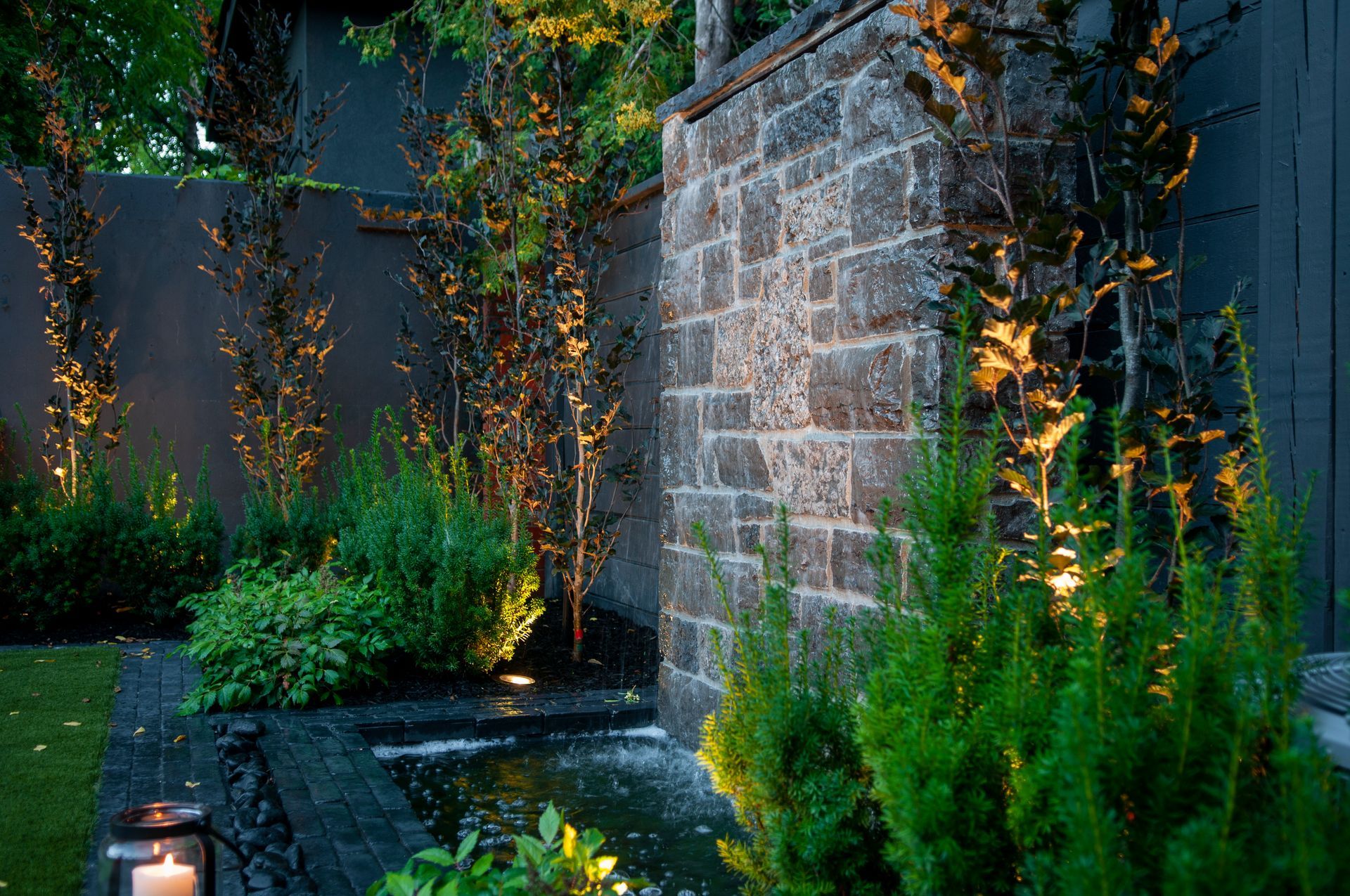 There is a lantern in the middle of the garden.