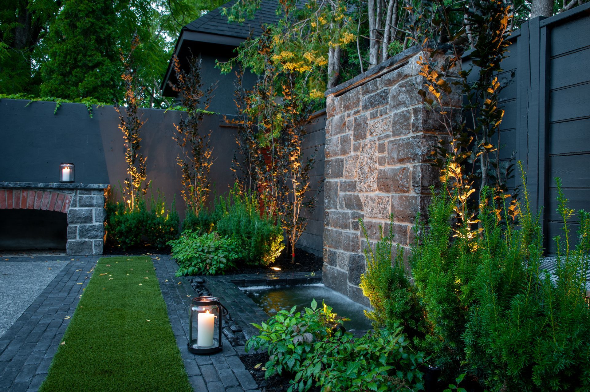 There is a lantern in the middle of the garden.