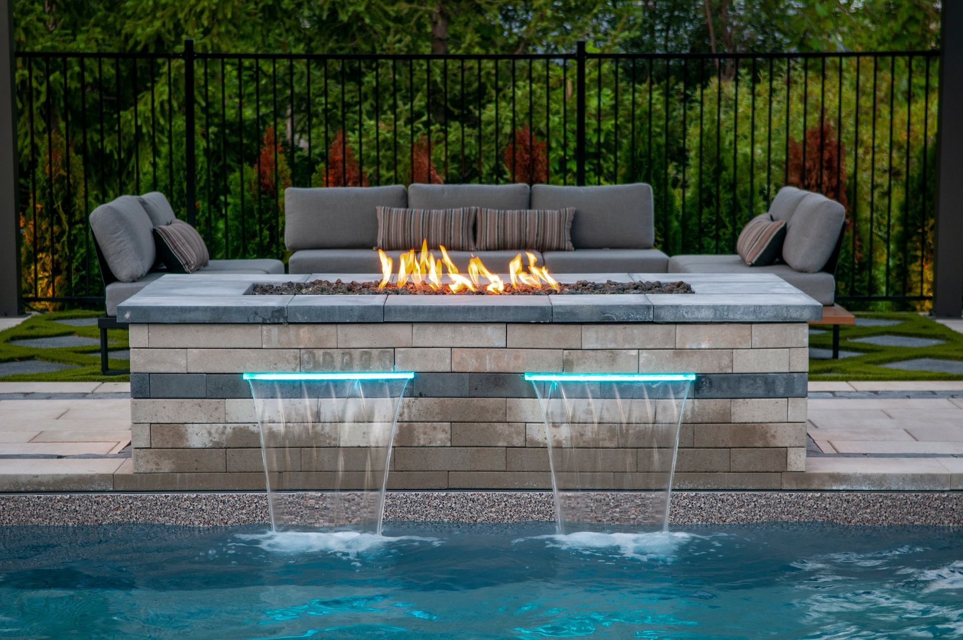 There is a fire pit in the middle of the pool.