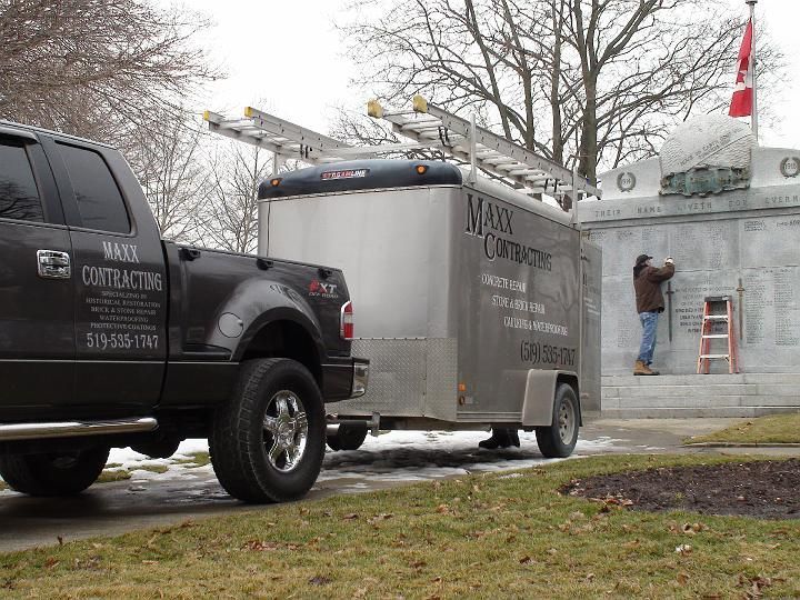 a truck that says maxx contracting on the side