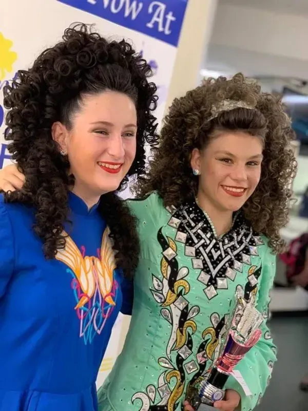 Two Young Women With Curly Hair Are Posing For A Picture — International Dance Affair In North Mackay, QLD