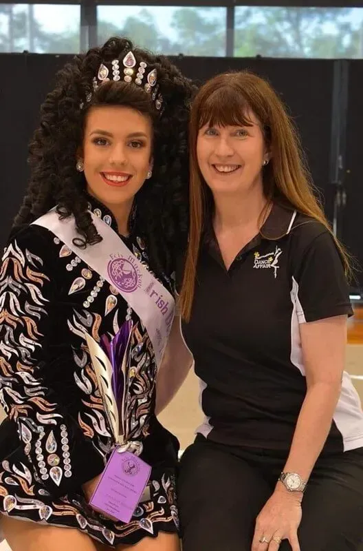 Two Women Are Posing For A Picture With One Wearing A Sash — International Dance Affair In North Mackay, QLD