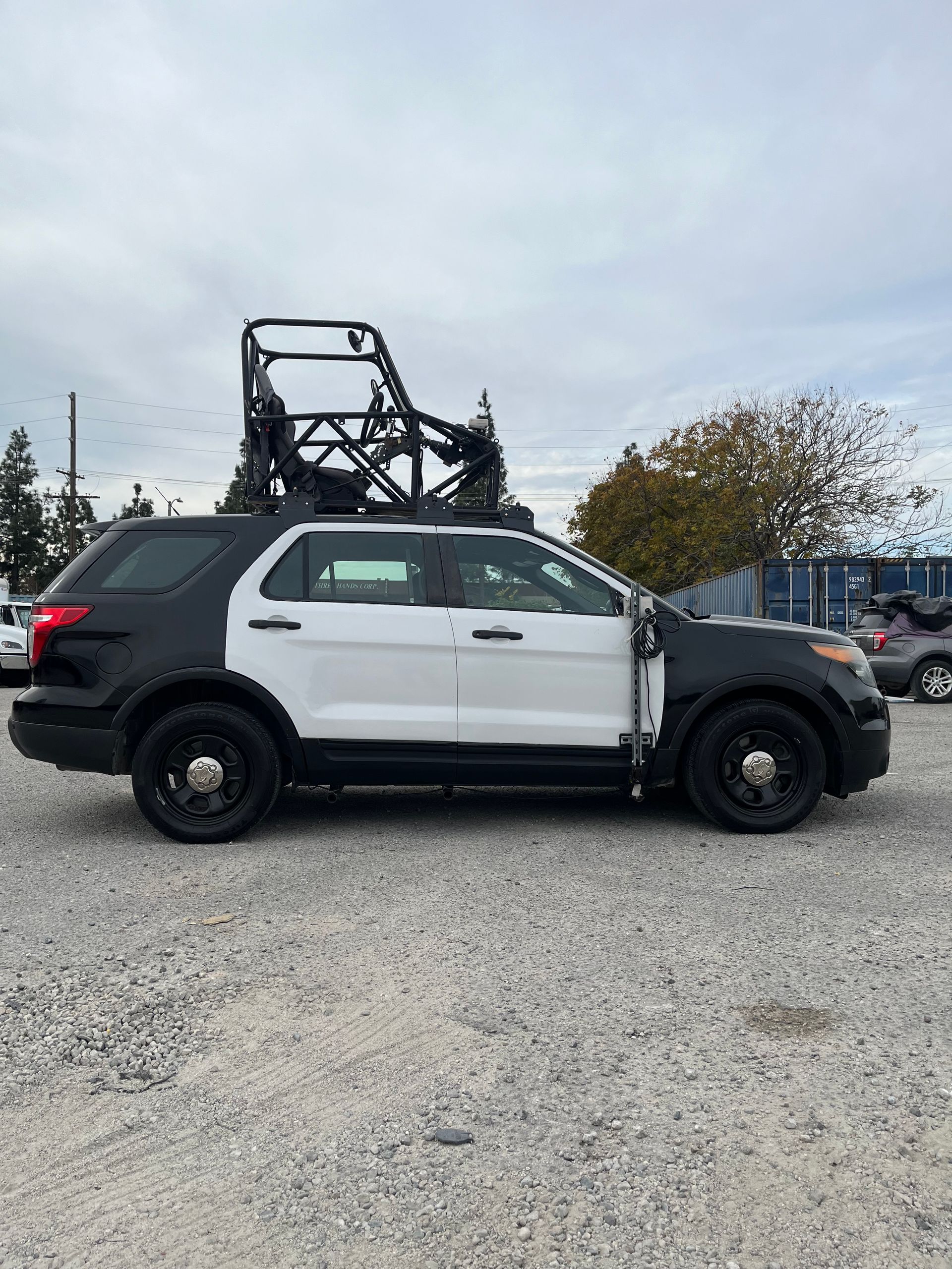 Pod rig installed in black and white car