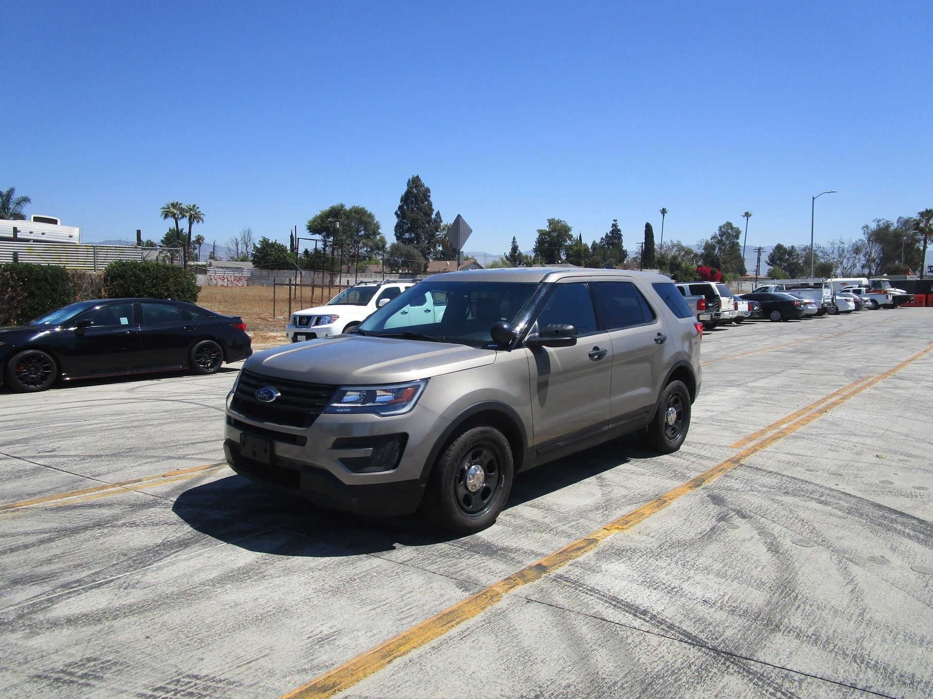 a ford explorerr car is parked and ready to install pod rigs for film shooting.