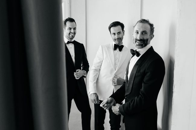 Groom with groomsmen at Villa Arvedi Verona in black and white during luxury wedding preparation