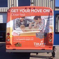truity credit union tail bus wrap