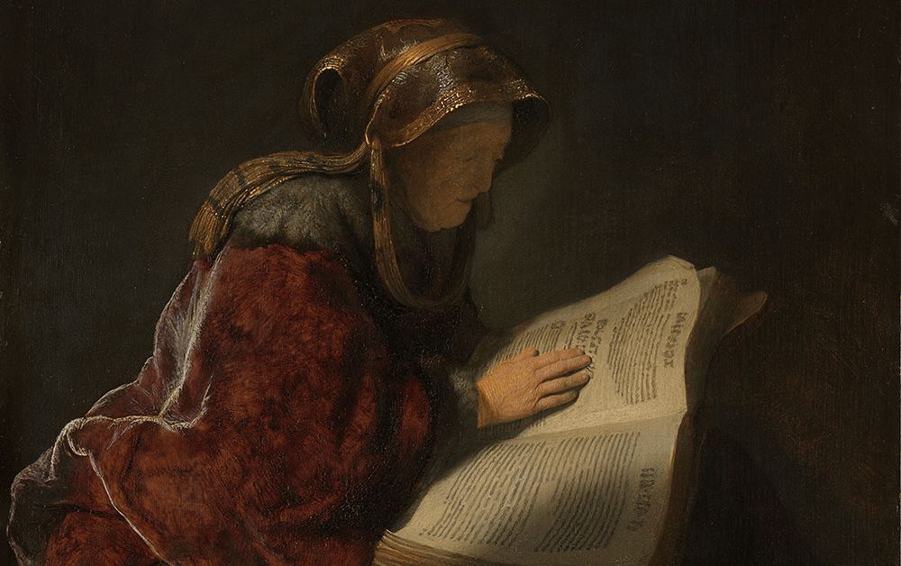 Rembrandt painting of Anna the Prophetess. Anna reading Hebrew Scriptures.