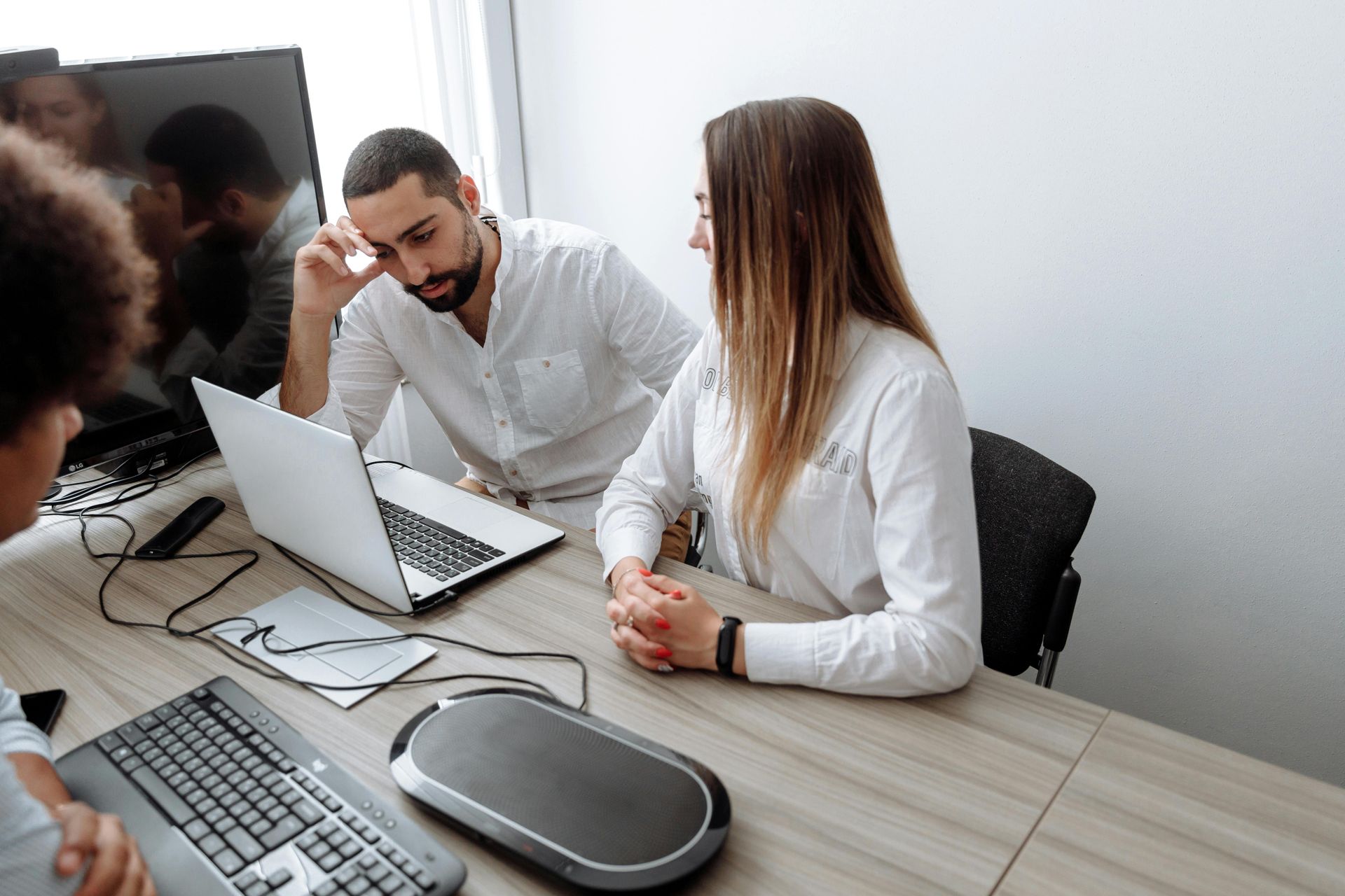 Small business team experiencing IT challenges and slow support from outdated provider