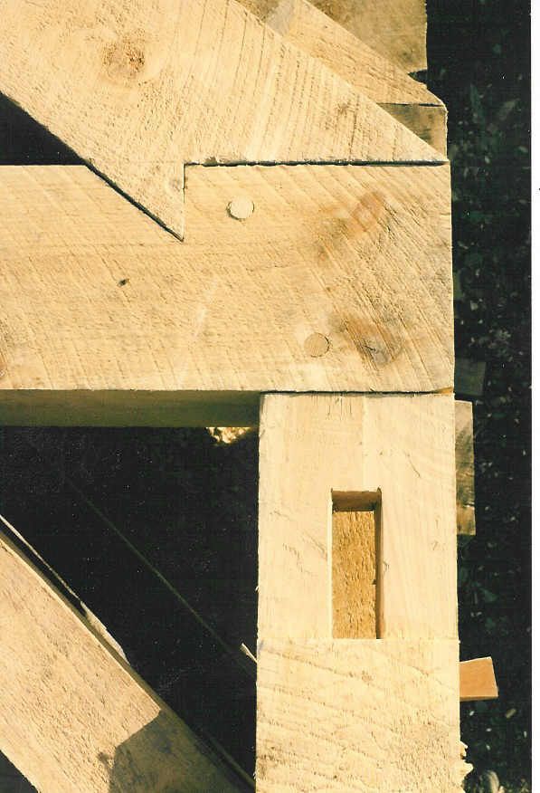 A close up of a piece of wood with a hole in it