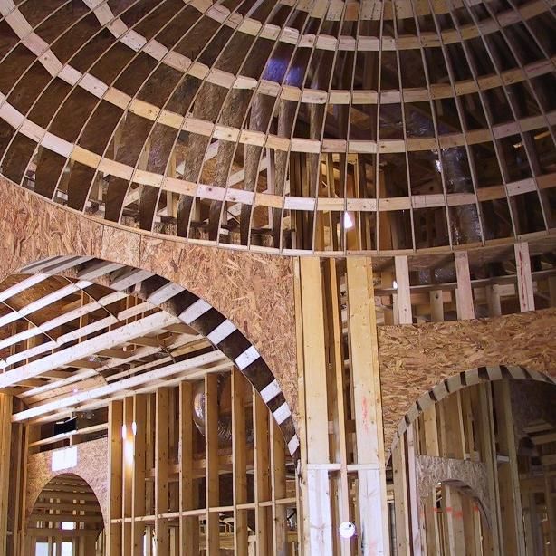 A building under construction with a dome shaped ceiling
