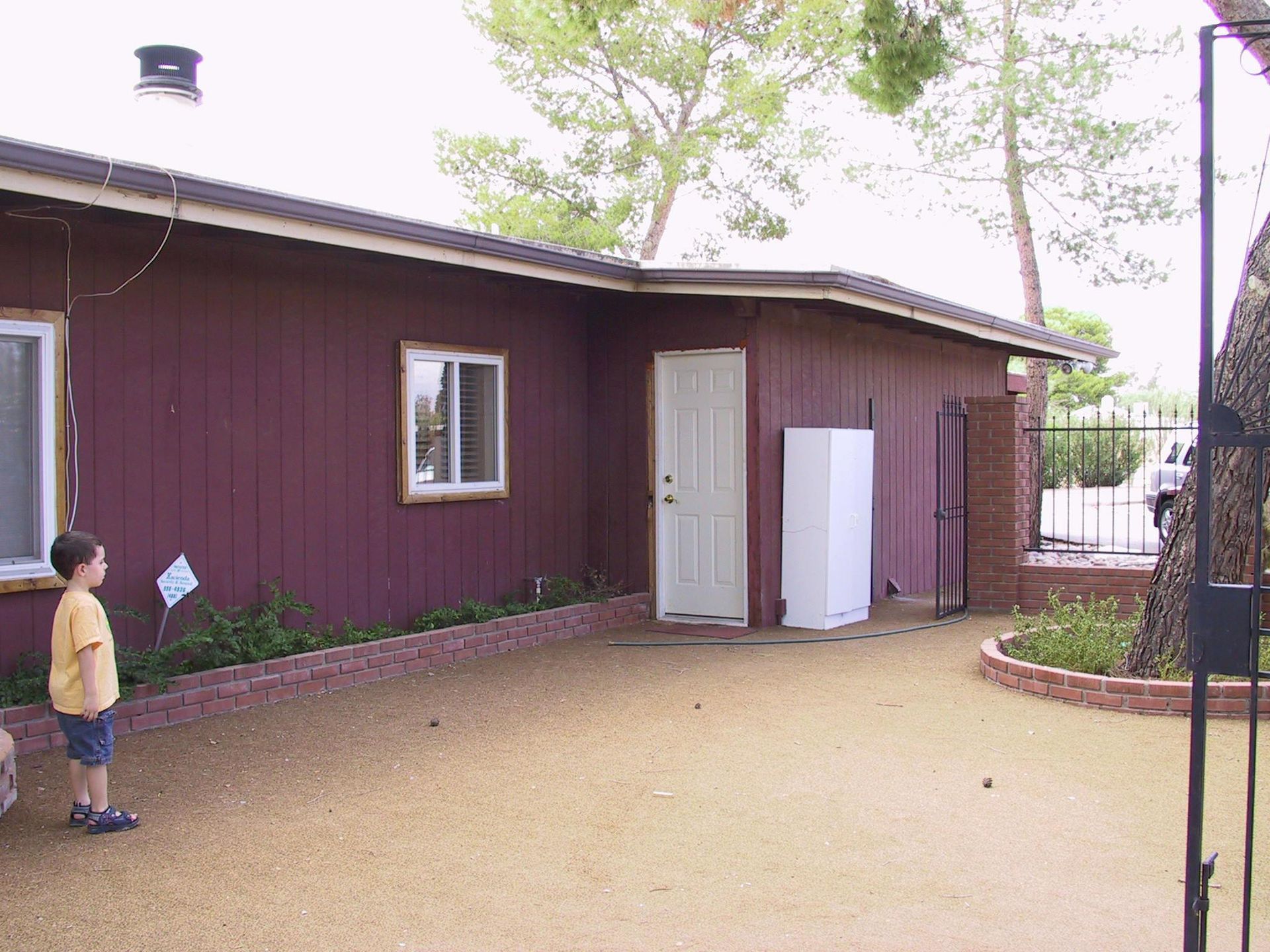 A kitchen counter with a white granite counter top