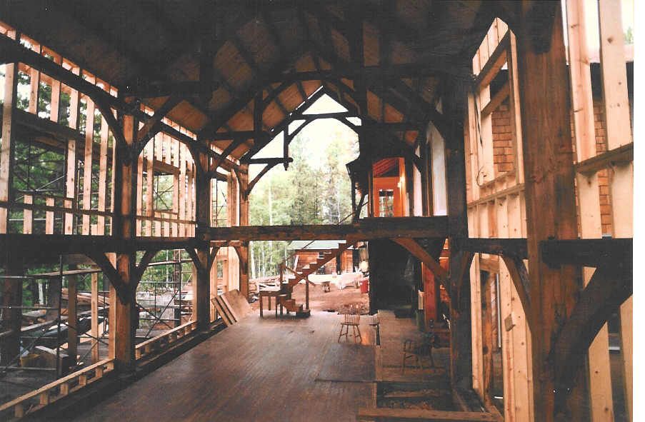 The inside of a wooden building under construction
