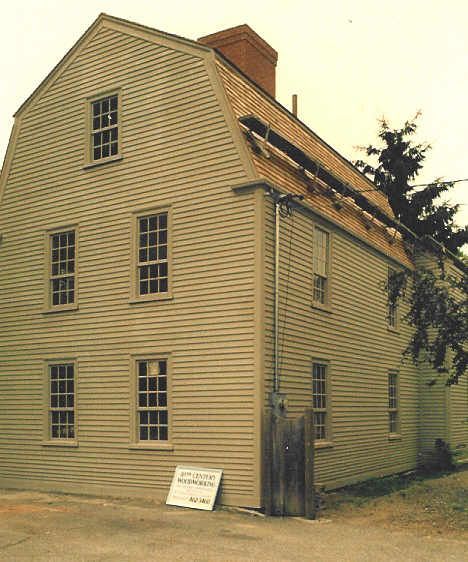 A large house with a sign on the side that says william smith