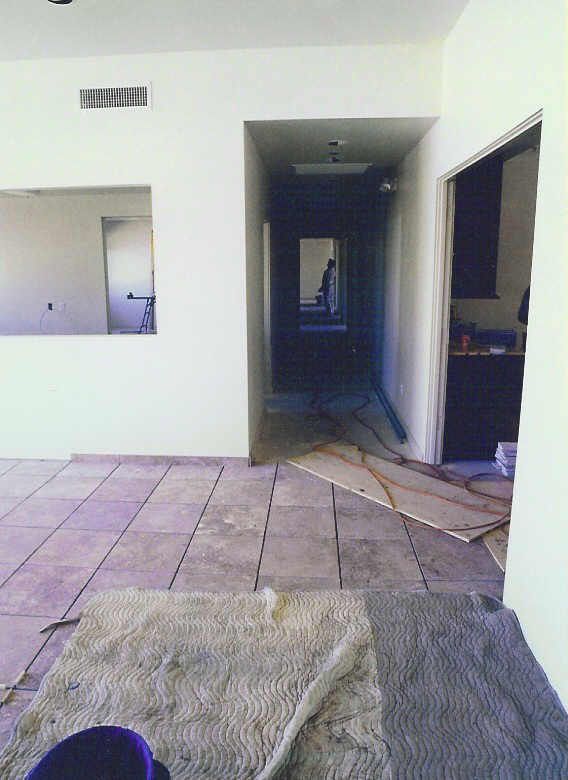 A hallway in a house that is being remodeled