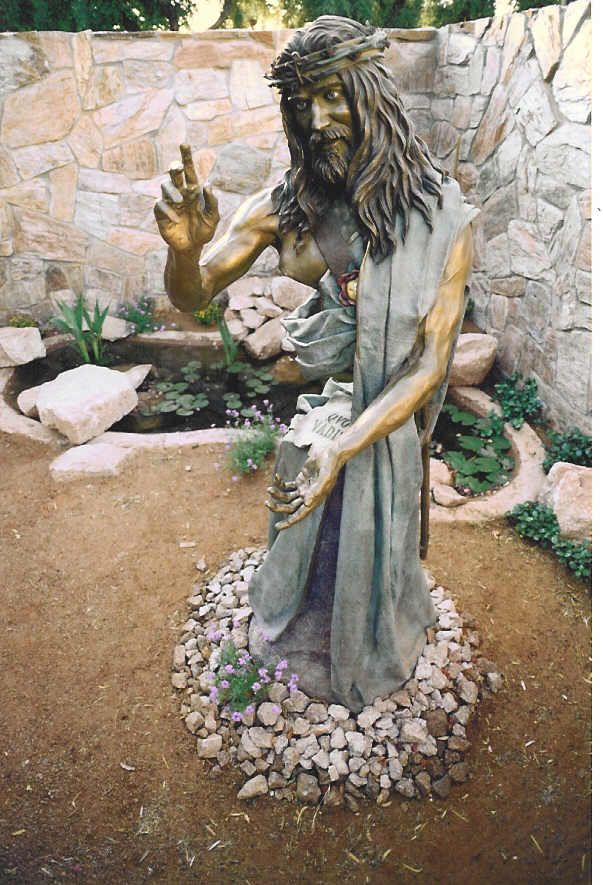 A statue of jesus with a crown of thorns on his head