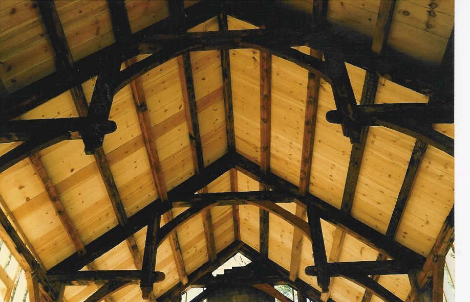 Looking up at the ceiling of a building made of wood