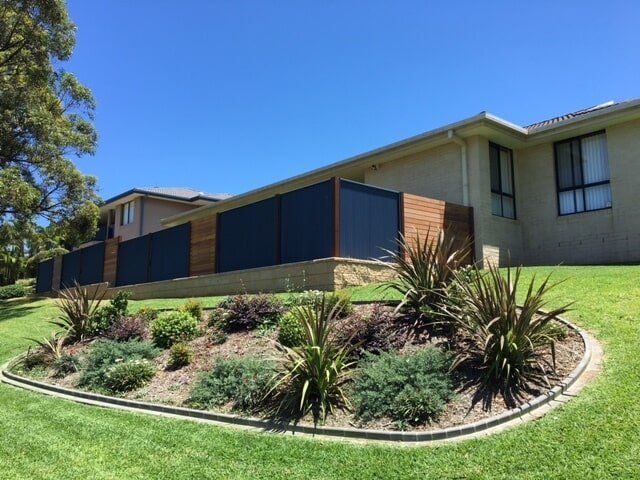 Blue Fence within the Lawn — Fencing in Port Macquarie, NSW