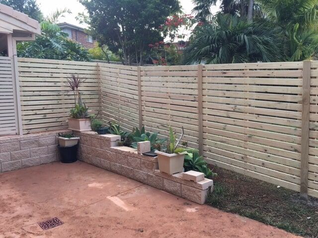 Wooden Fence beside the Plants — Fencing in Port Macquarie, NSW