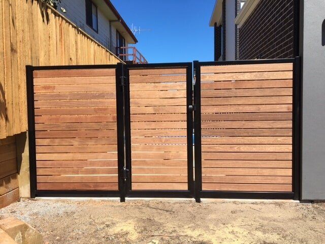 Wooden Gate with Black Corner — Fencing in Port Macquarie, NSW