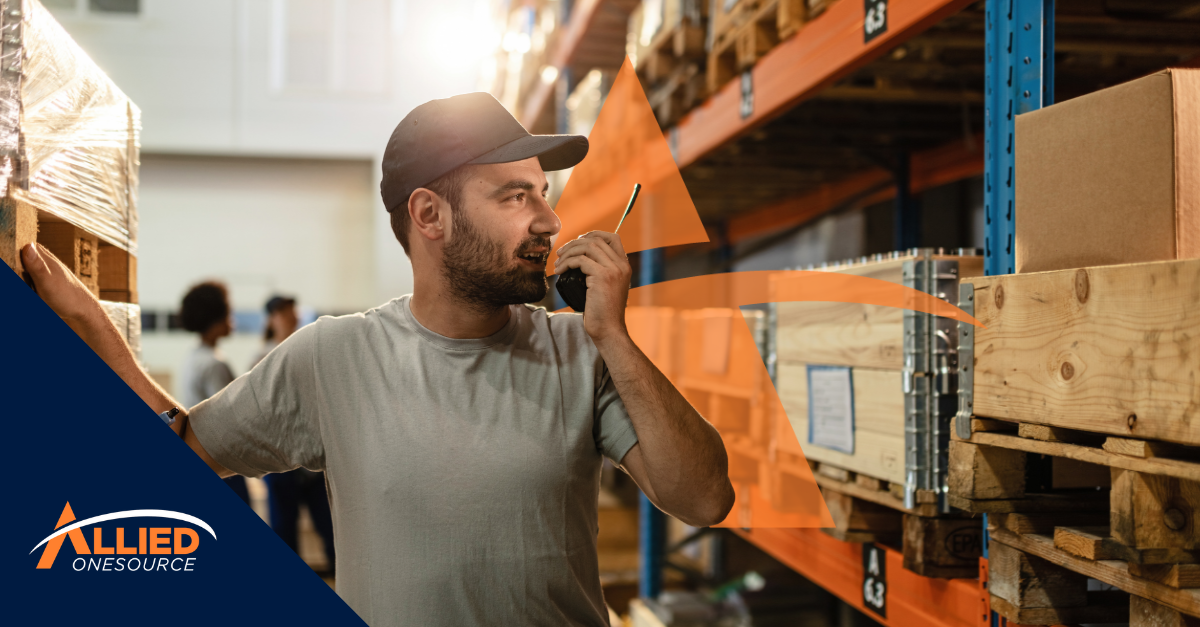 Warehouse employee managing inventory in logistics facility during seasonal hiring period