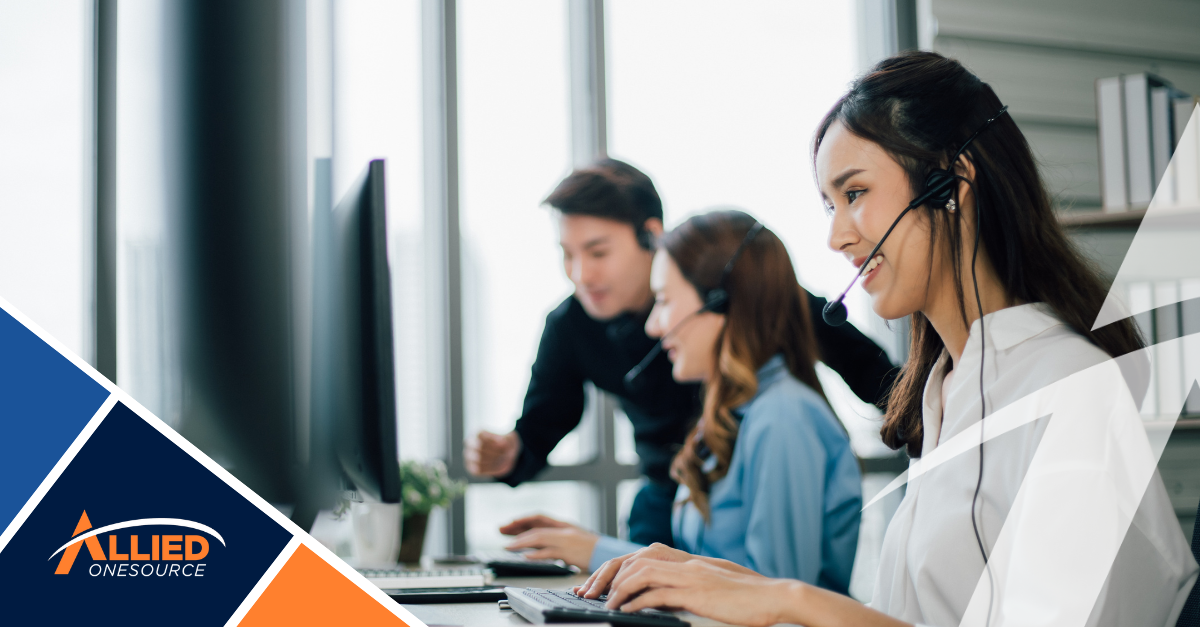 Customer service representative with headset working inmodern contact center reflecting 2026 contact