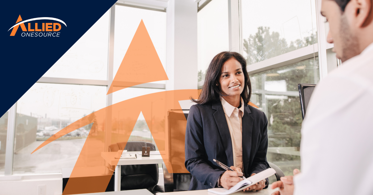  Recruiter conducting pre-hiring for next year interview with job candidate in professional office s