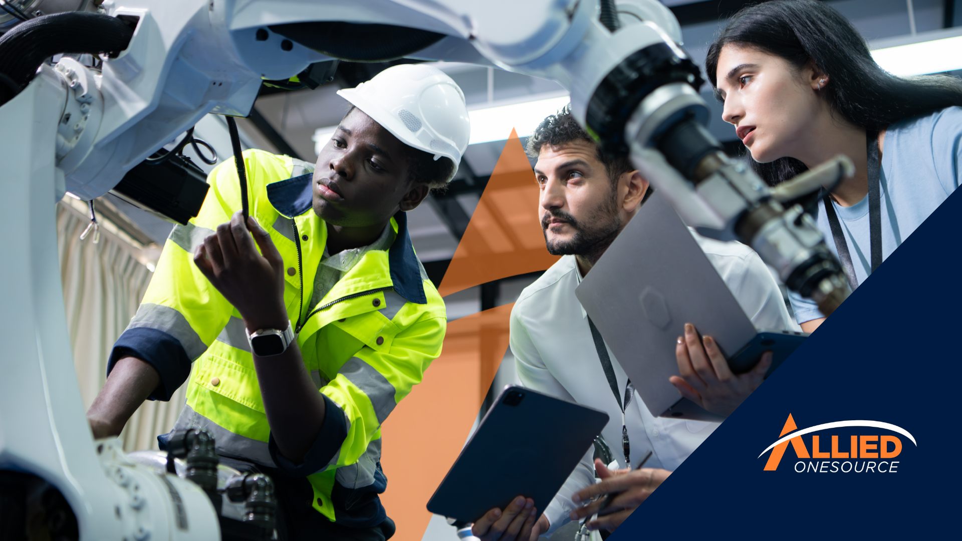 Industrial team collaborating on AI in workforce strategy implementation at manufacturing facility