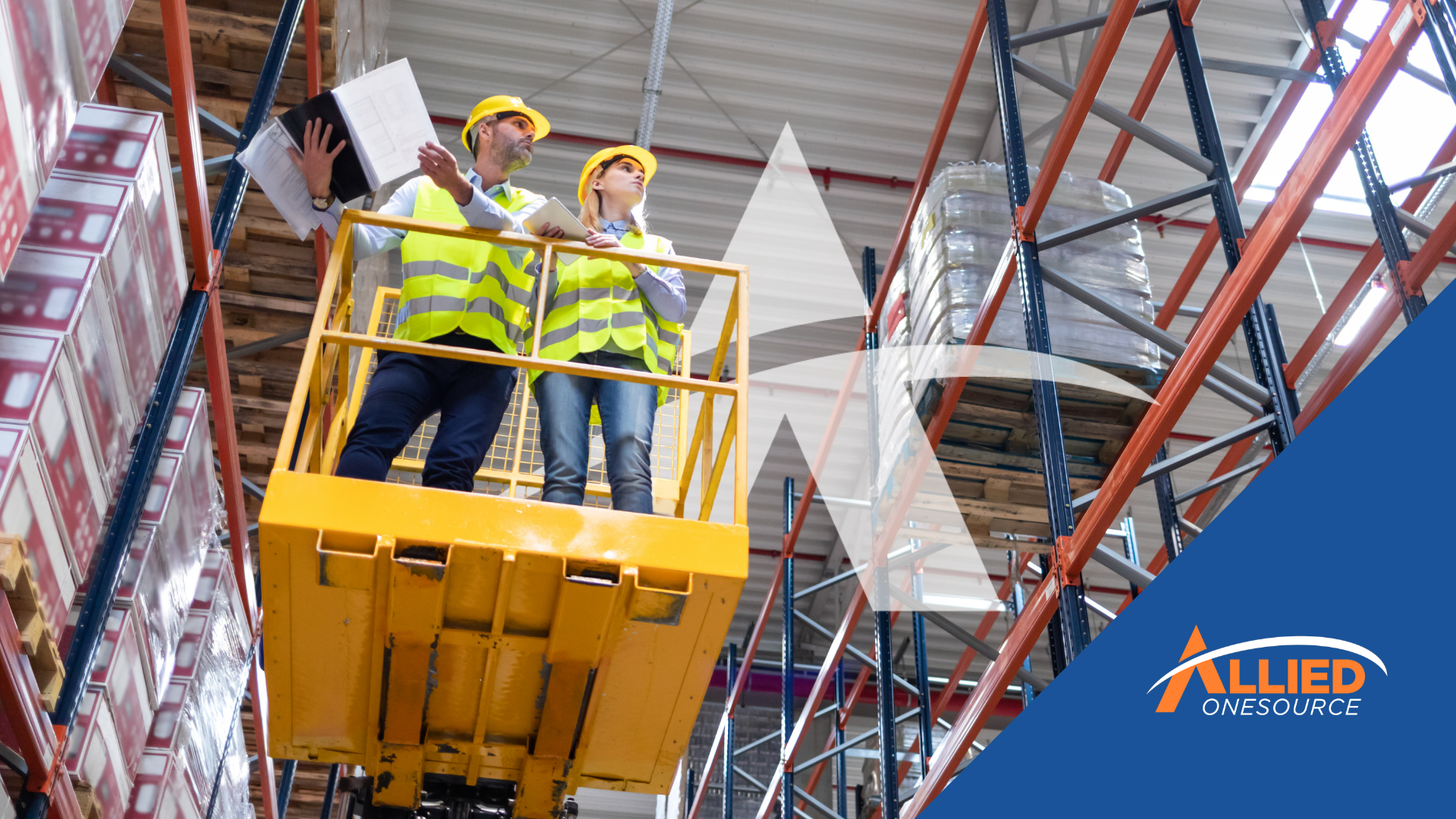 Warehouse workers on lift inspecting inventory highlighting seasonal hiring in distribution and logi