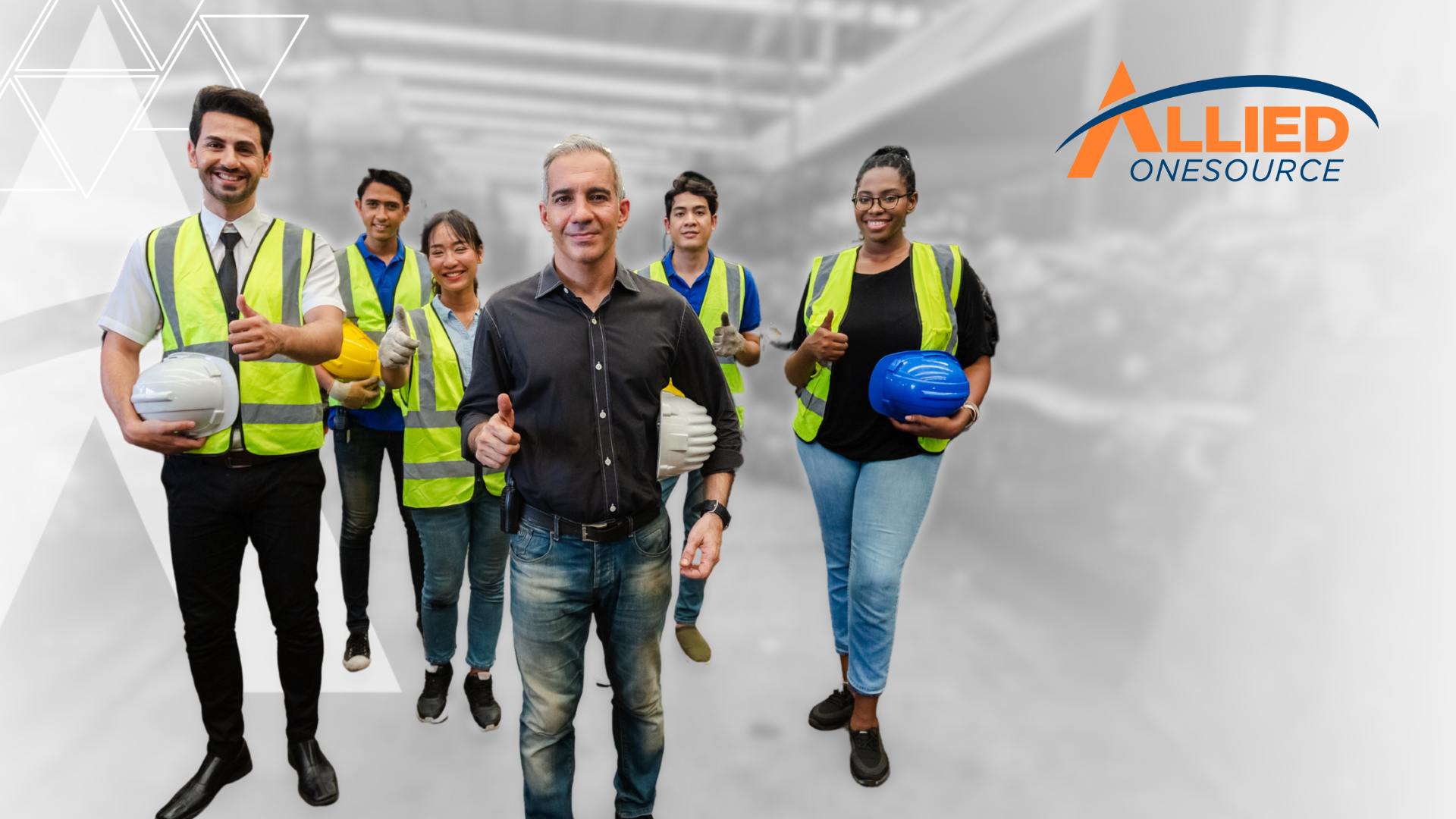 Diverse warehouse team in safety vests and hard hats representing holiday hiring and seasonal workfo