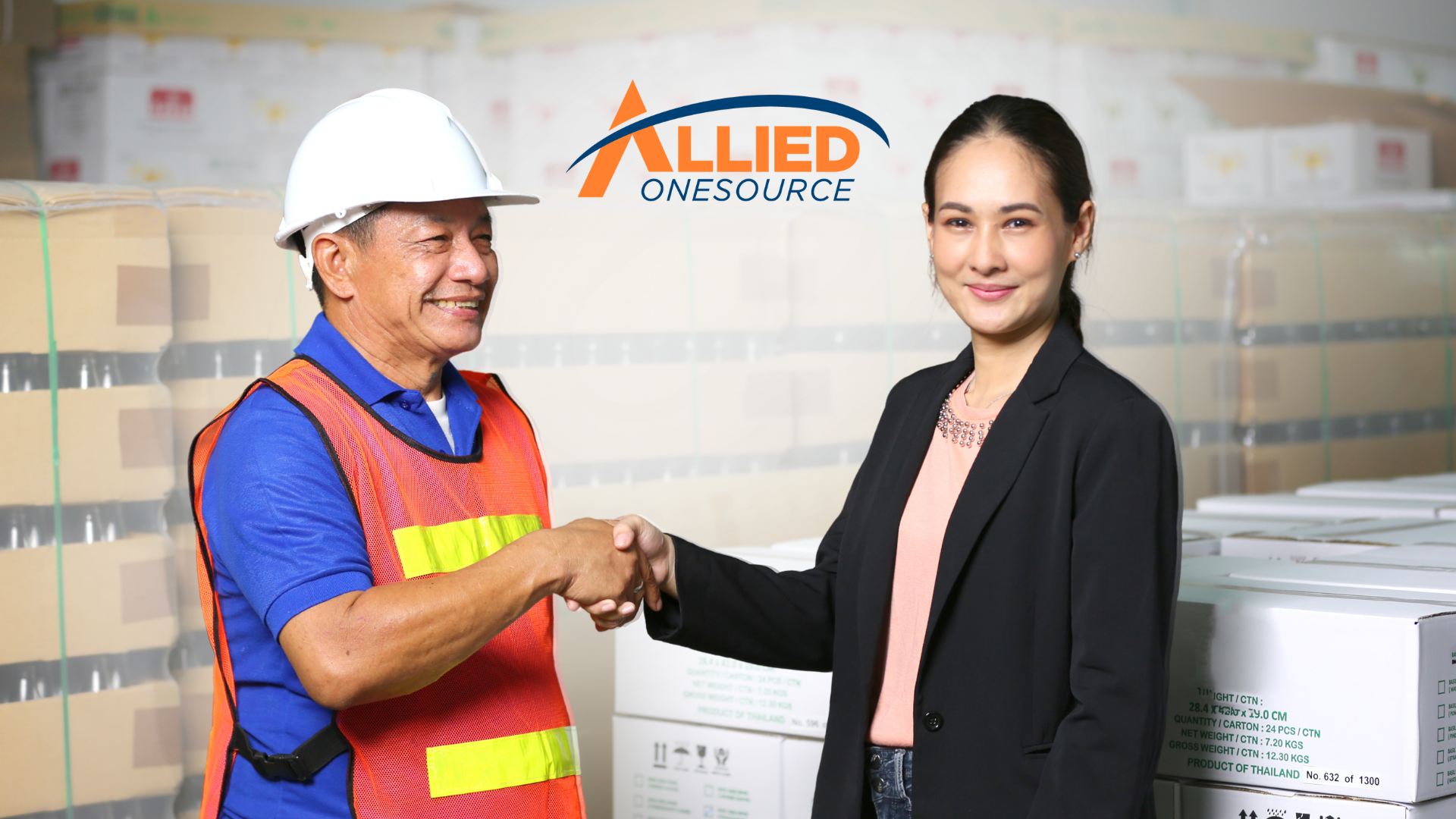 Employer and manufacturing employee shaking hands after a successful salary negotiation.