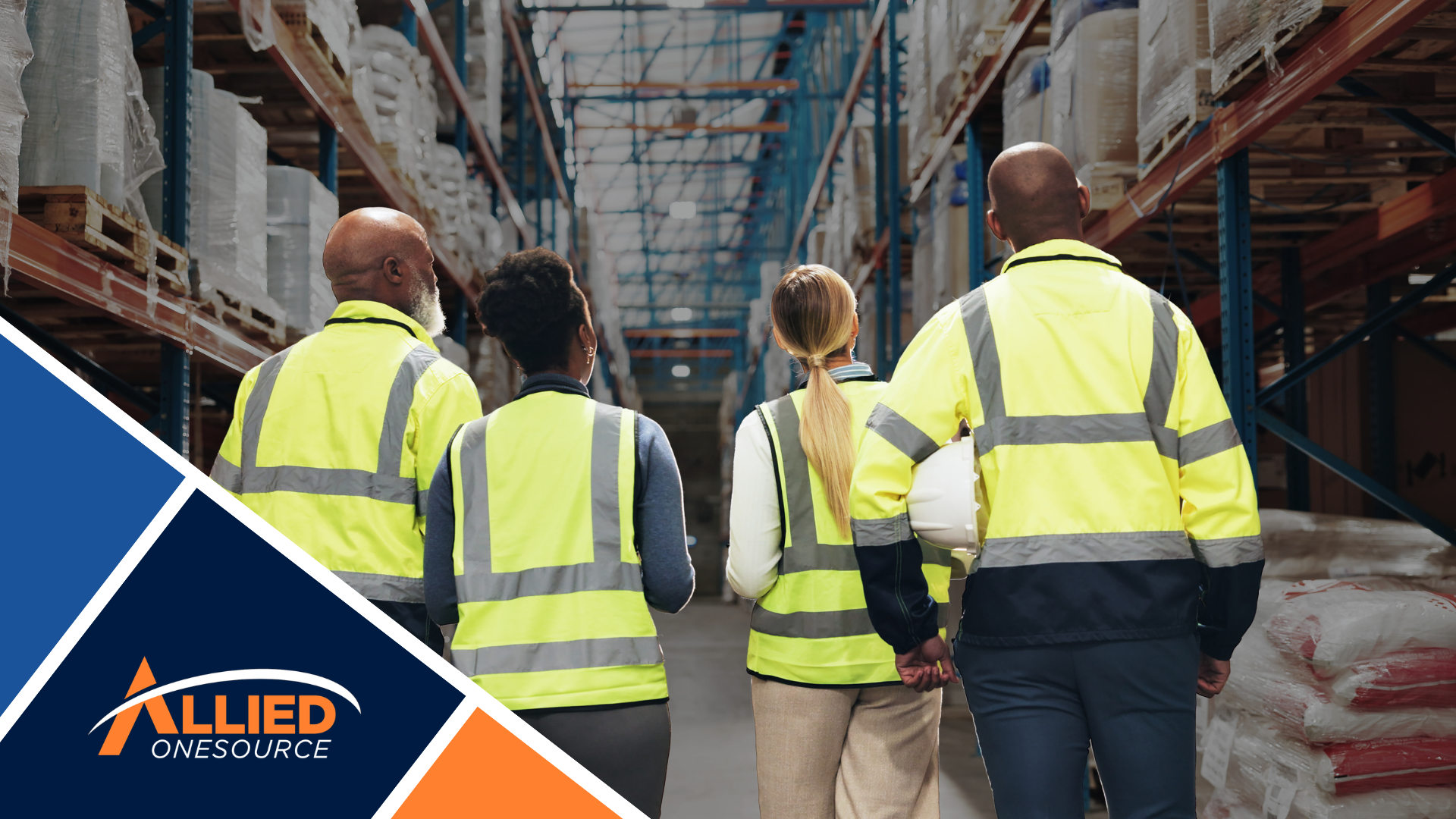Diverse warehouse team walks through a facility, illustrating smart headcount planning.