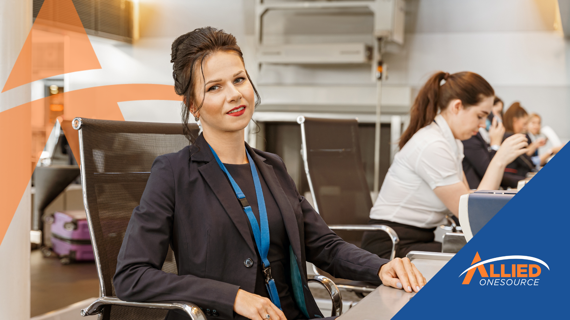 A woman at a desk with a laptop, focused on managing vacation season staffing for her finance team's