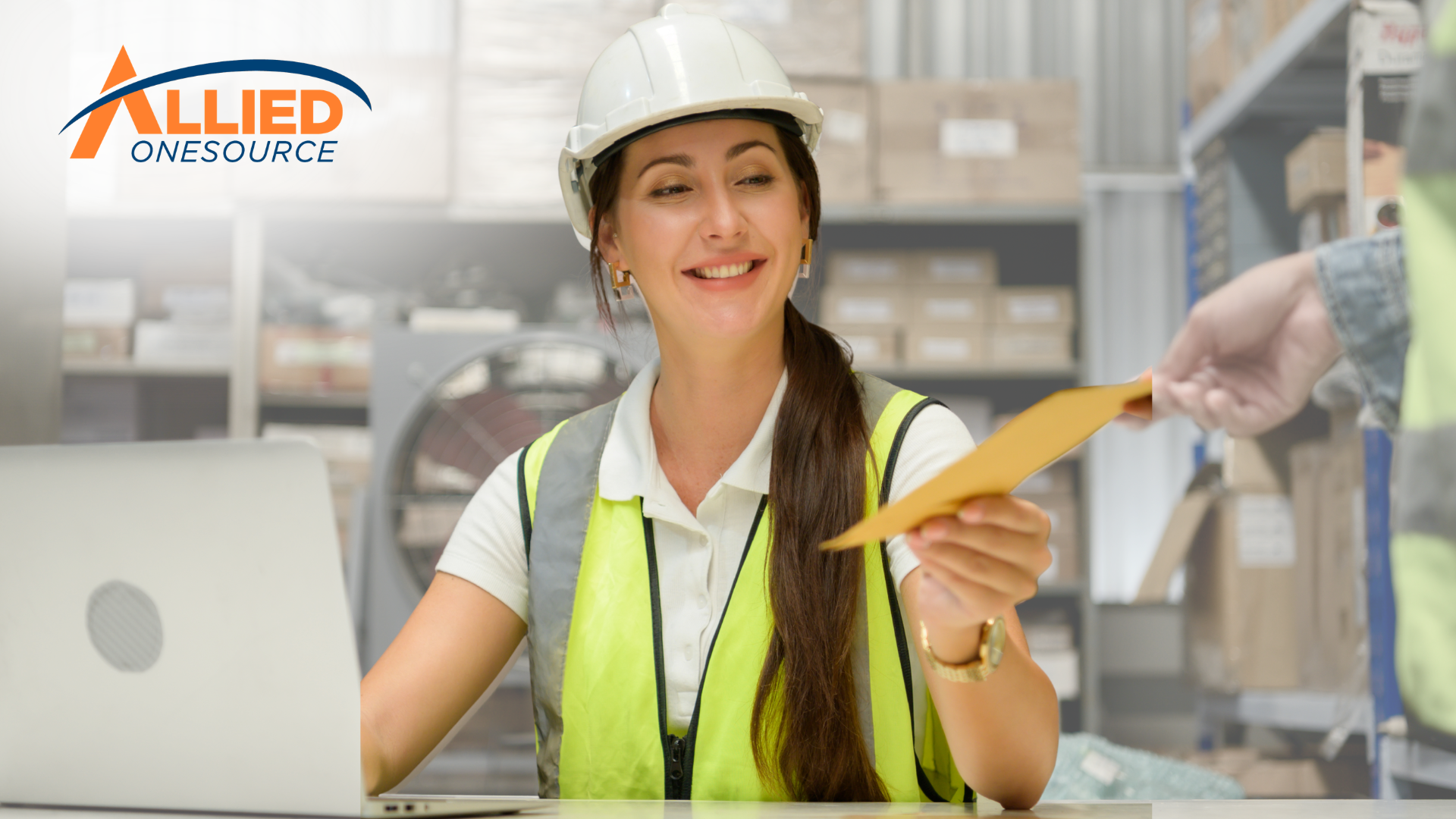 Warehouse worker in a hard hat, shows how to ask for a raise.