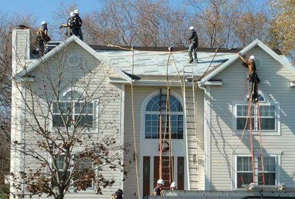 Workers doing roof repair — West Middlesex, PA — Thomas W. Roofing, LLC