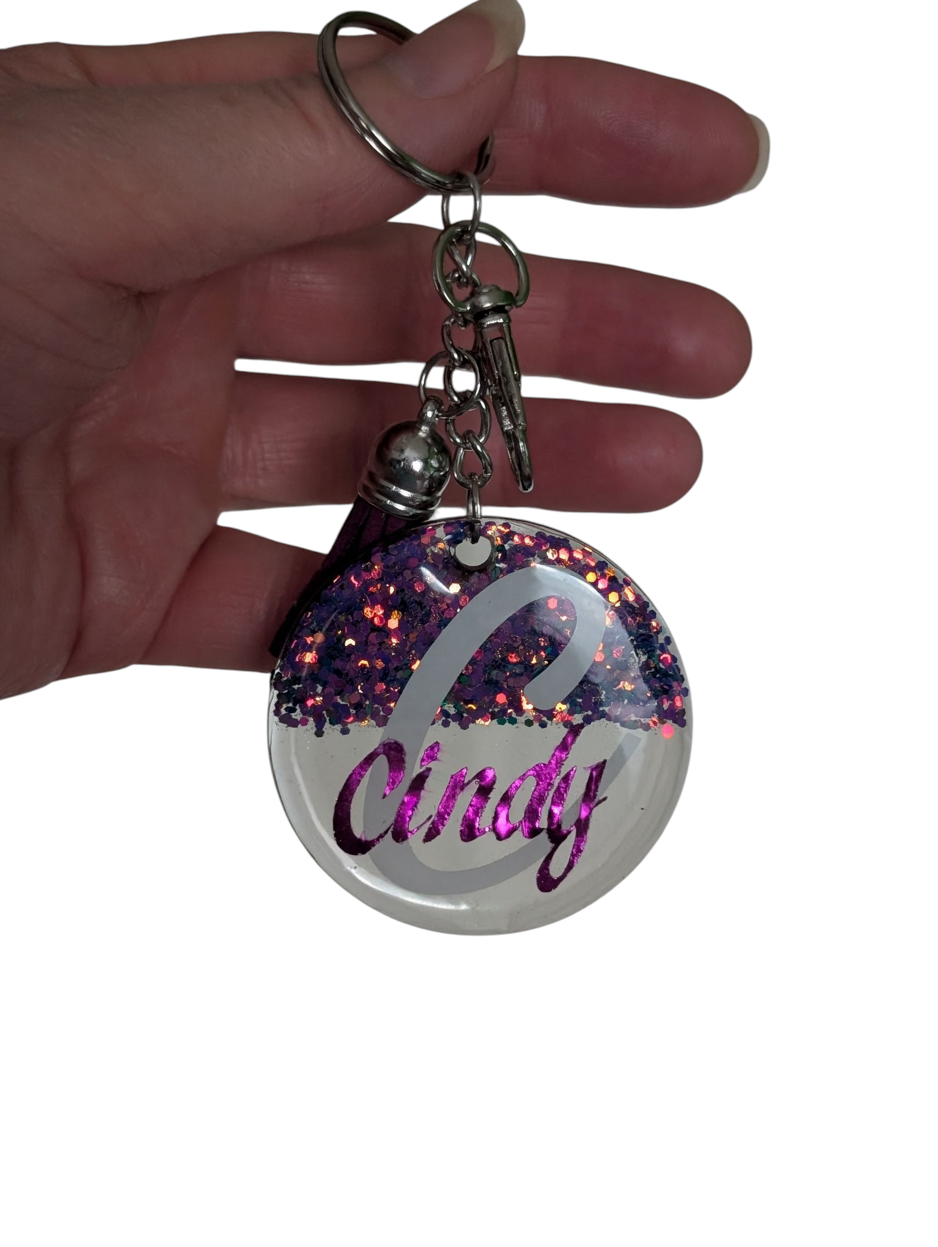 Personalized glitter and clear keychain in purple and silver glitter