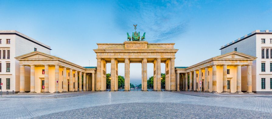 The brandenburg gate is a very large building in berlin.