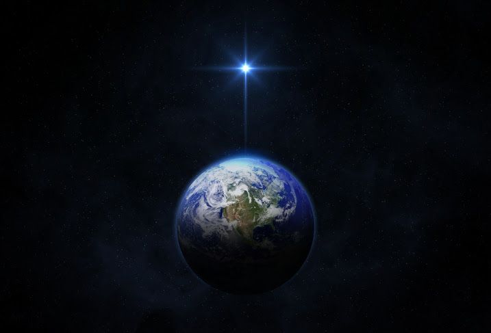 Earth with continents visible, under a bright blue star in dark space.